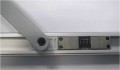 Umiejscowienie w szynie samozamykacza ogranicznika otwarcia A153 Assa Abloy